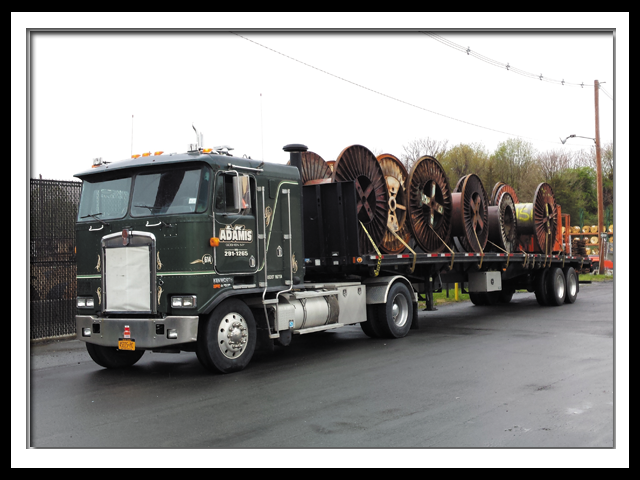 flatbed_trucking_service_coils_-_florida_ny.png
